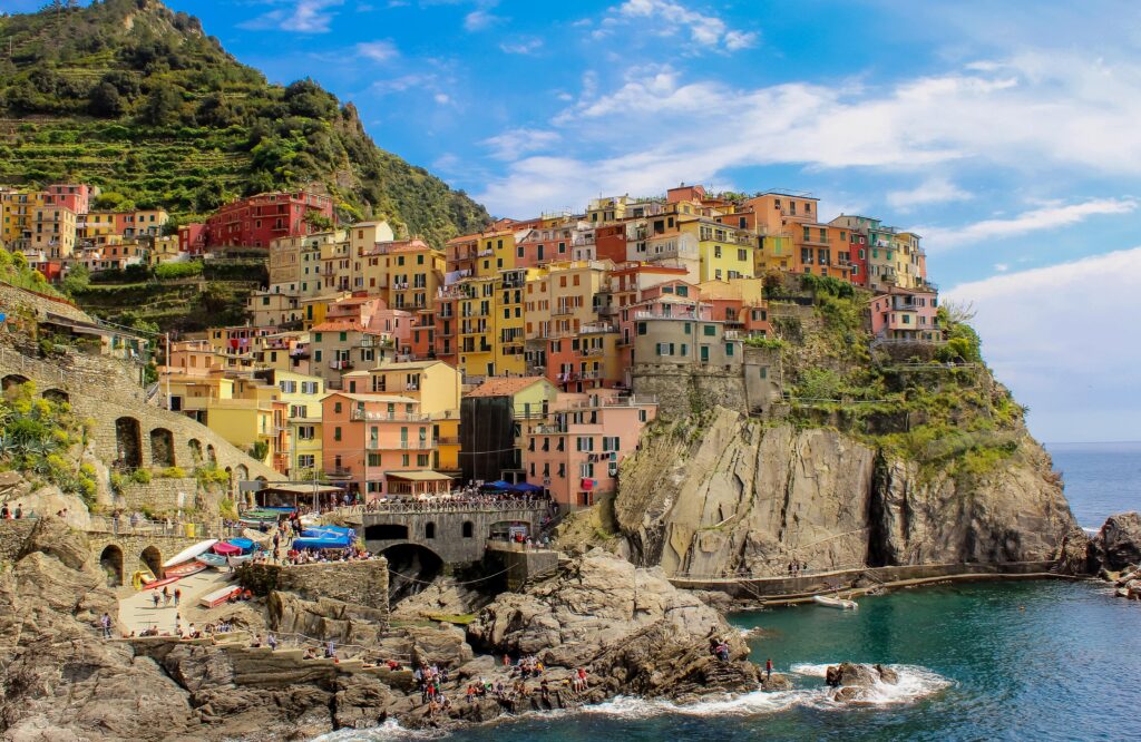 colourful houses perched on rock with sea while spending 3 days Cinque Terre
