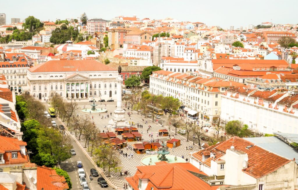 red roof tops, square with fountain when 4 day Lisbon itinerary sites to visit