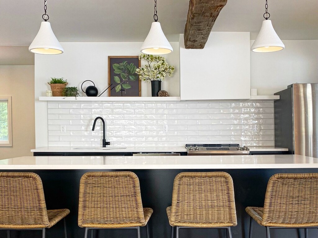 4 stools in white kitchen in airbnb prince edward county