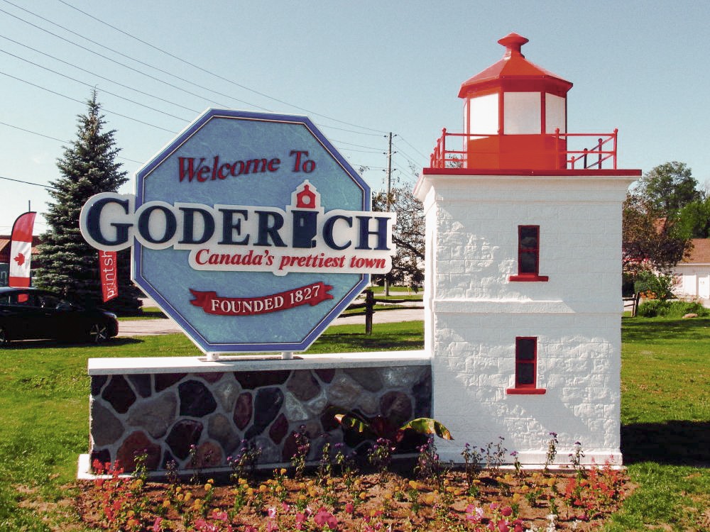 lighthouse and sign saying Goderich