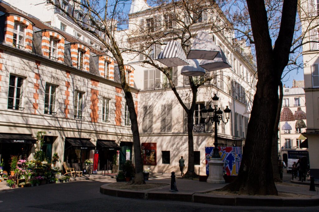 square with large trees and buildings in 6th district paris