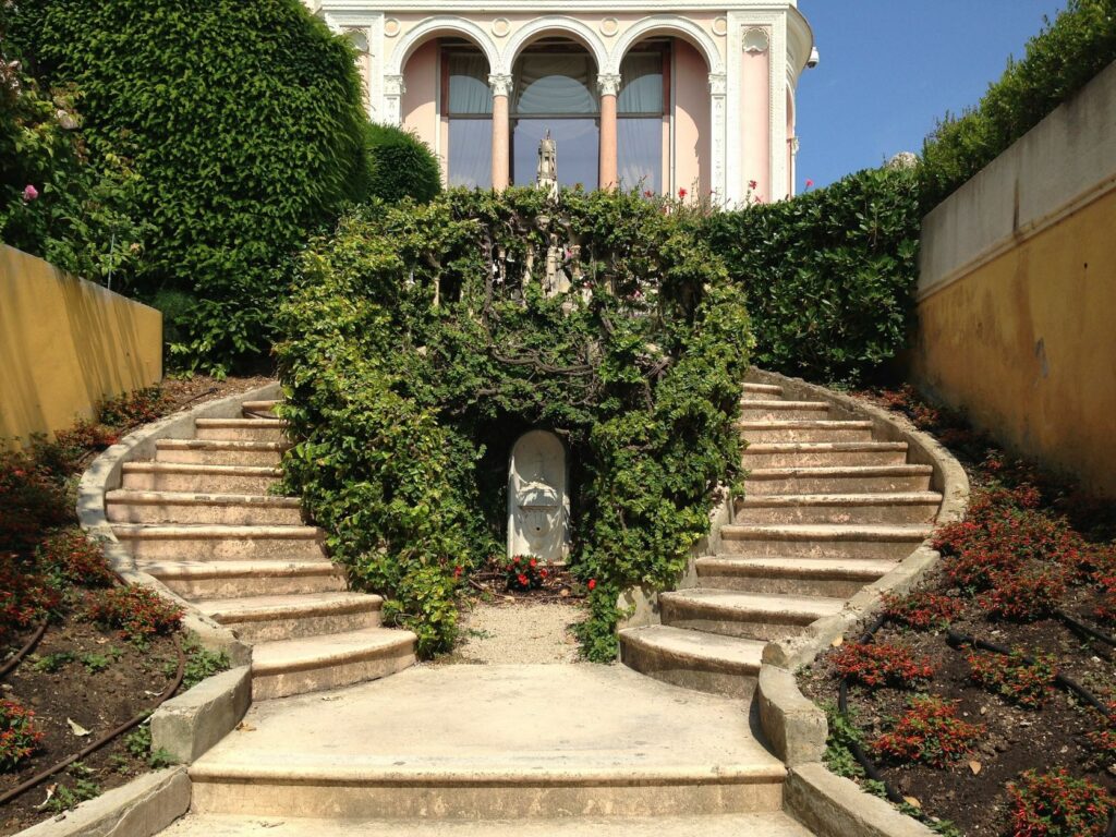 curved stone staircase with garden in nice france 