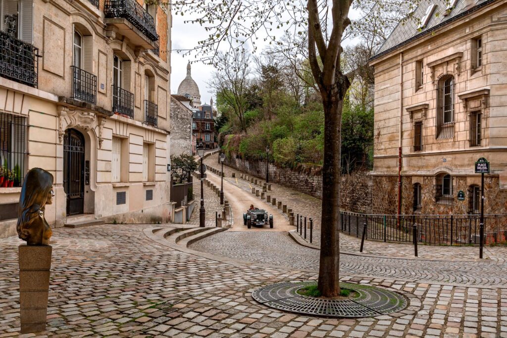 cobblestone road with buildings in paris streets