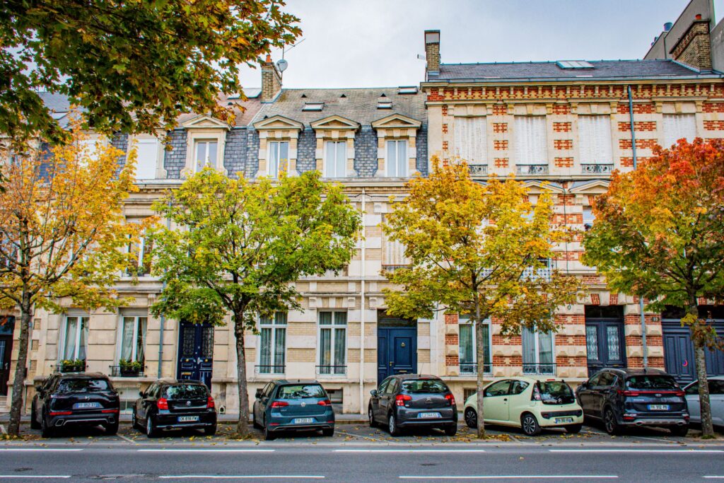 row of houses in reims with trees