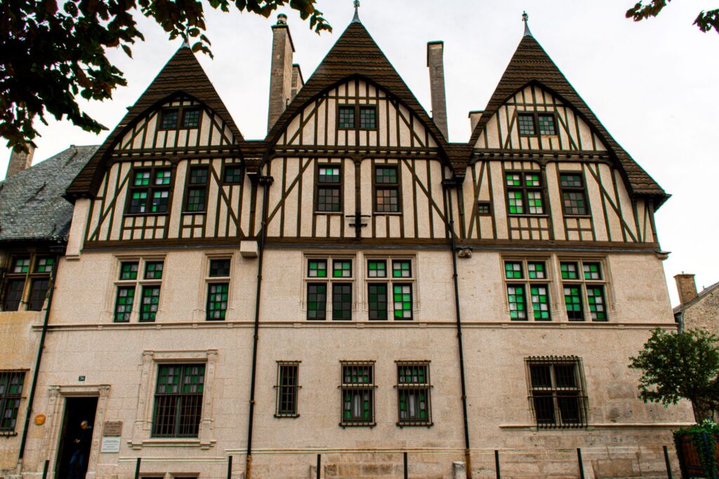 chateau inspired building in Reims France with green stained glass windows