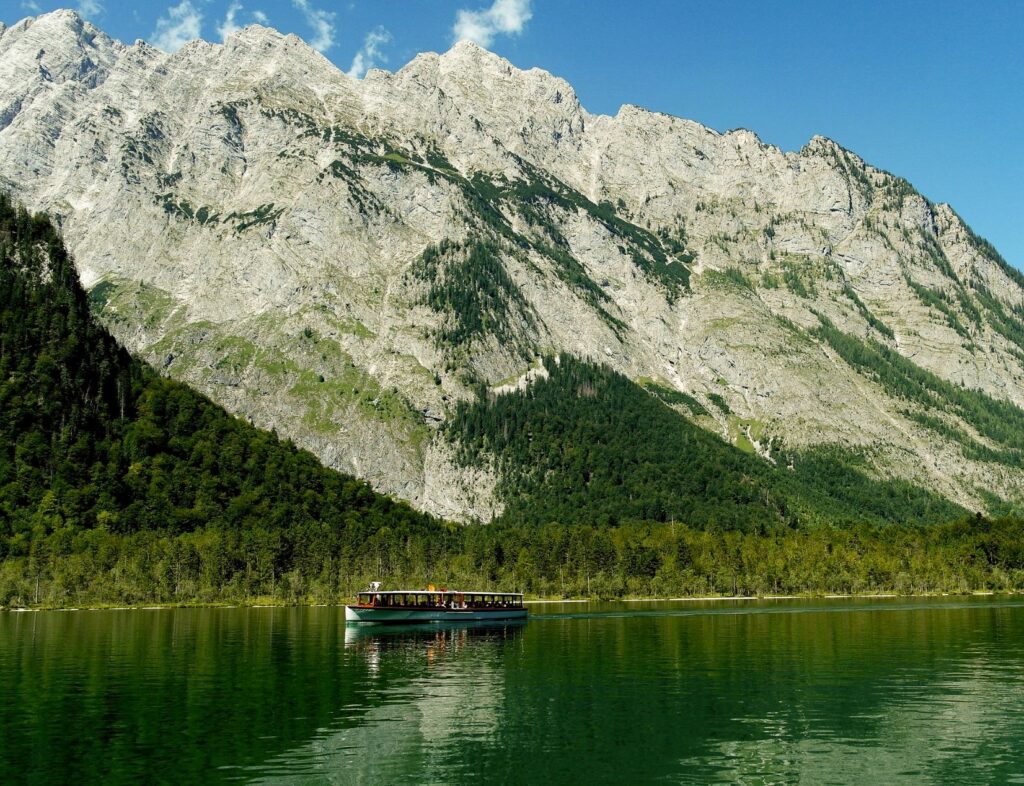 emerald green lake with mountains