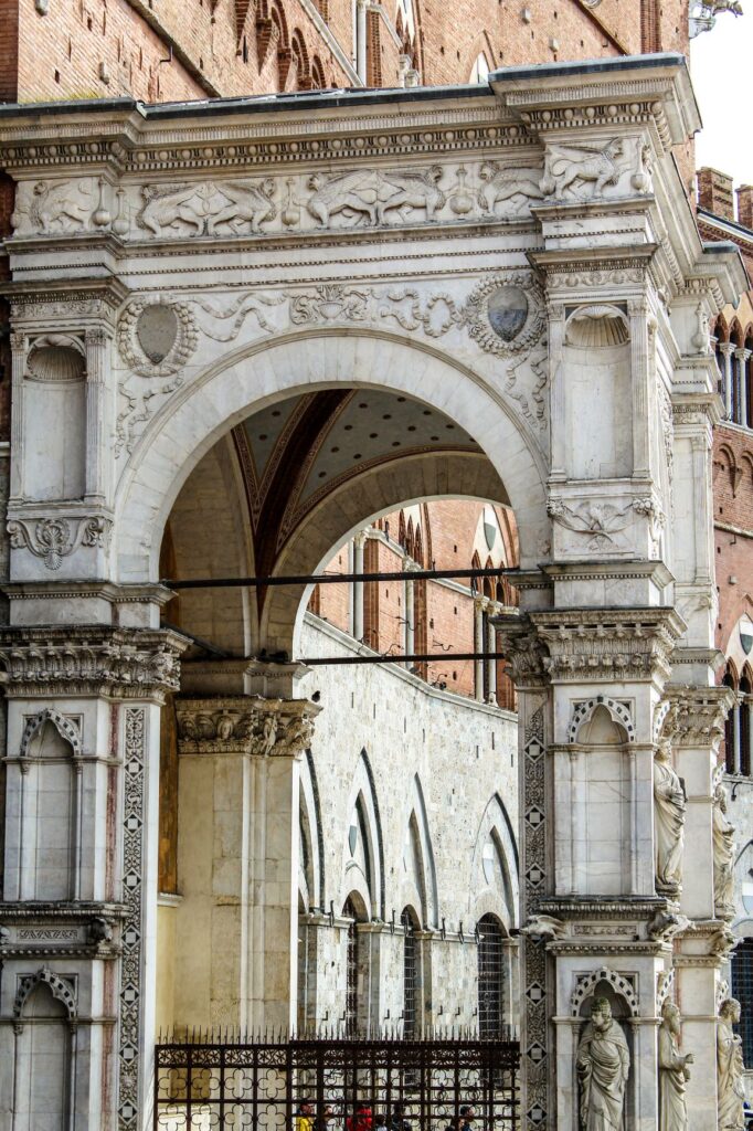 marble archway with iron gate in siena