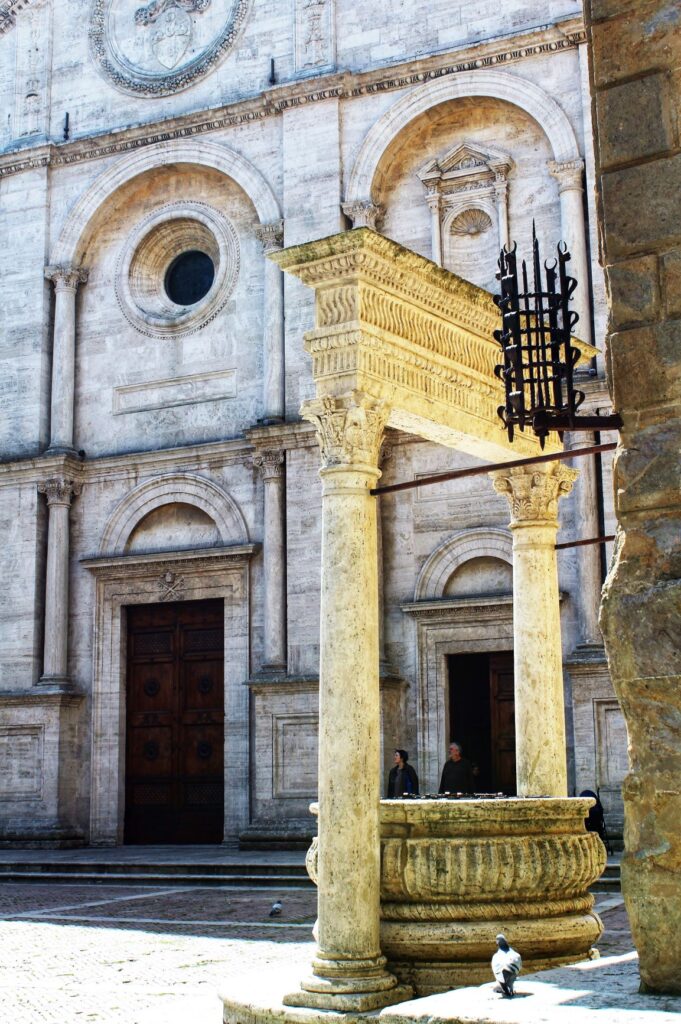 water well and church in pienza