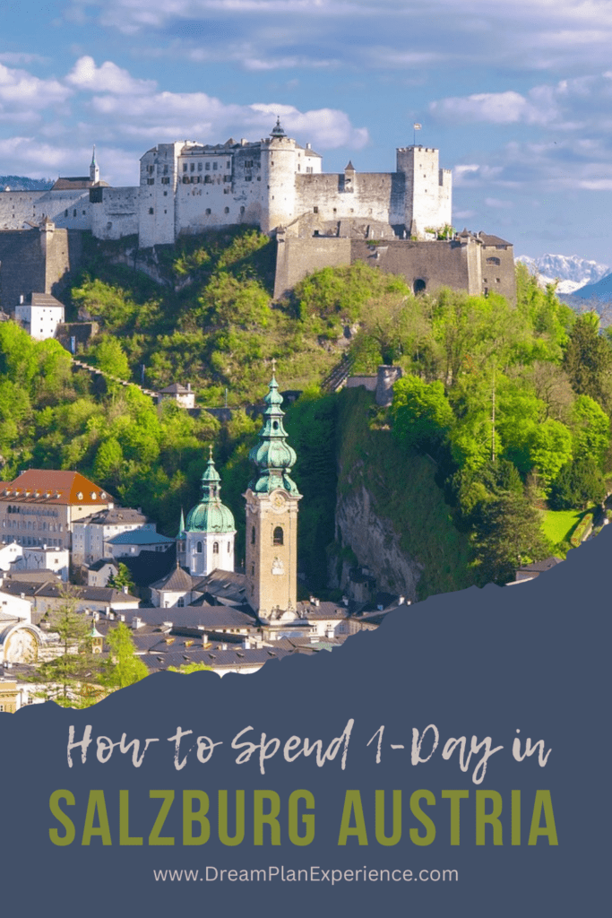 visit this hilltop castle on your 1 day Salzburg itinerary with church spires in the foreground