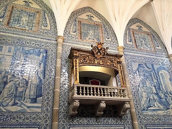 blue and white painted tiles on visit evora portugal