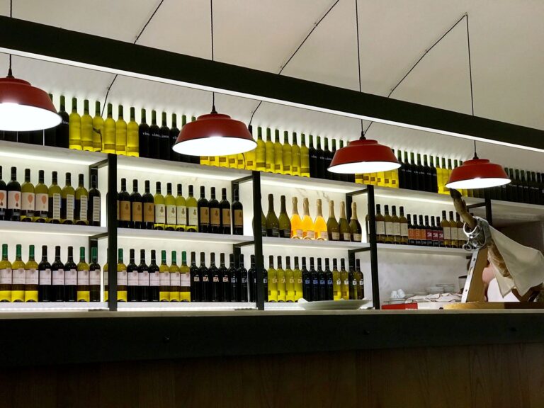 bottles of wine and olive oil in restaurant in evora portugal