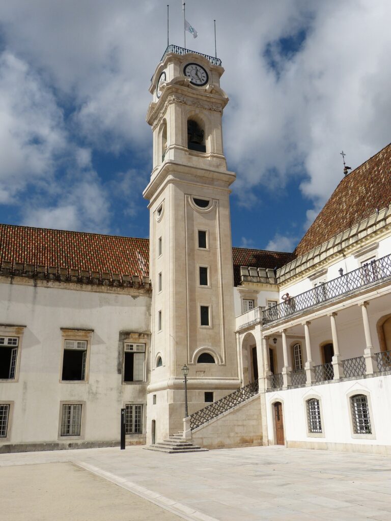 tall tower with connected building in coimbra university