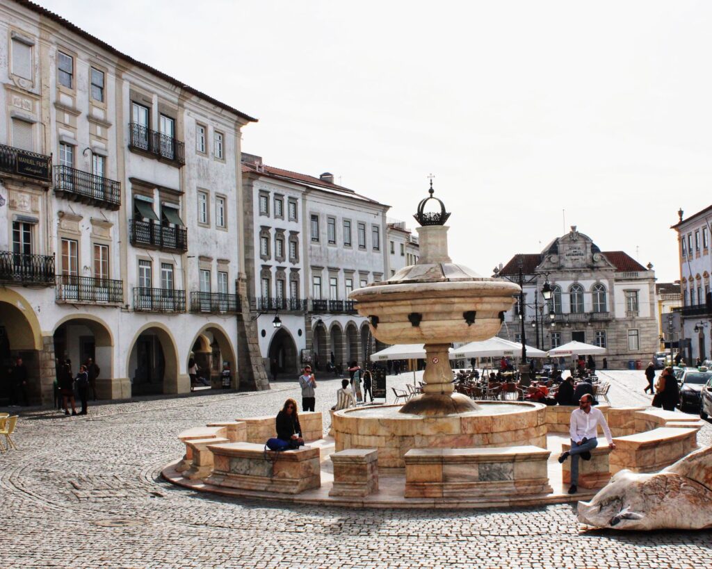 square with fountain in one day in Evora Portugal