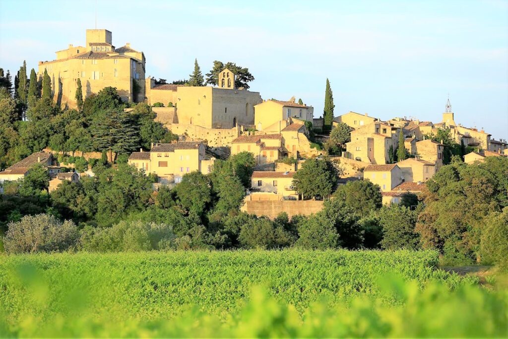 hilltop village with valley below considered to be one of the most beautiful villages in provence