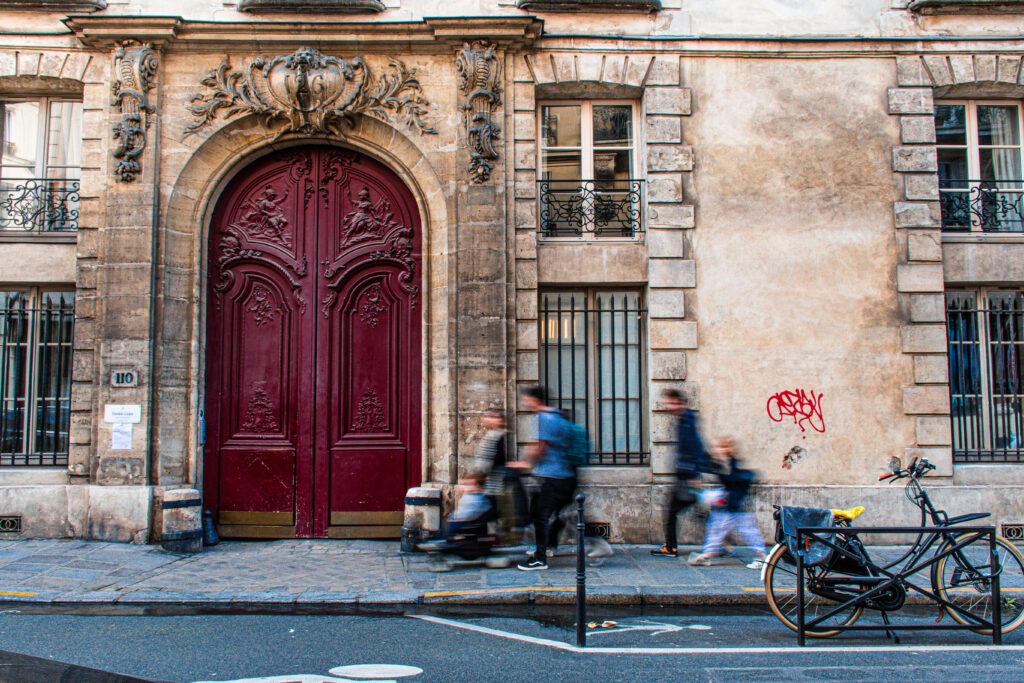 paris street with red door