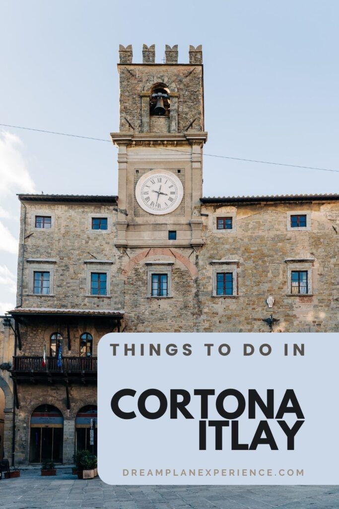 stone building with round clock and bell tower one of the top sites and things to do in cortona italy 