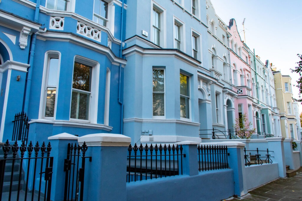 row of colourful houses in notting hill