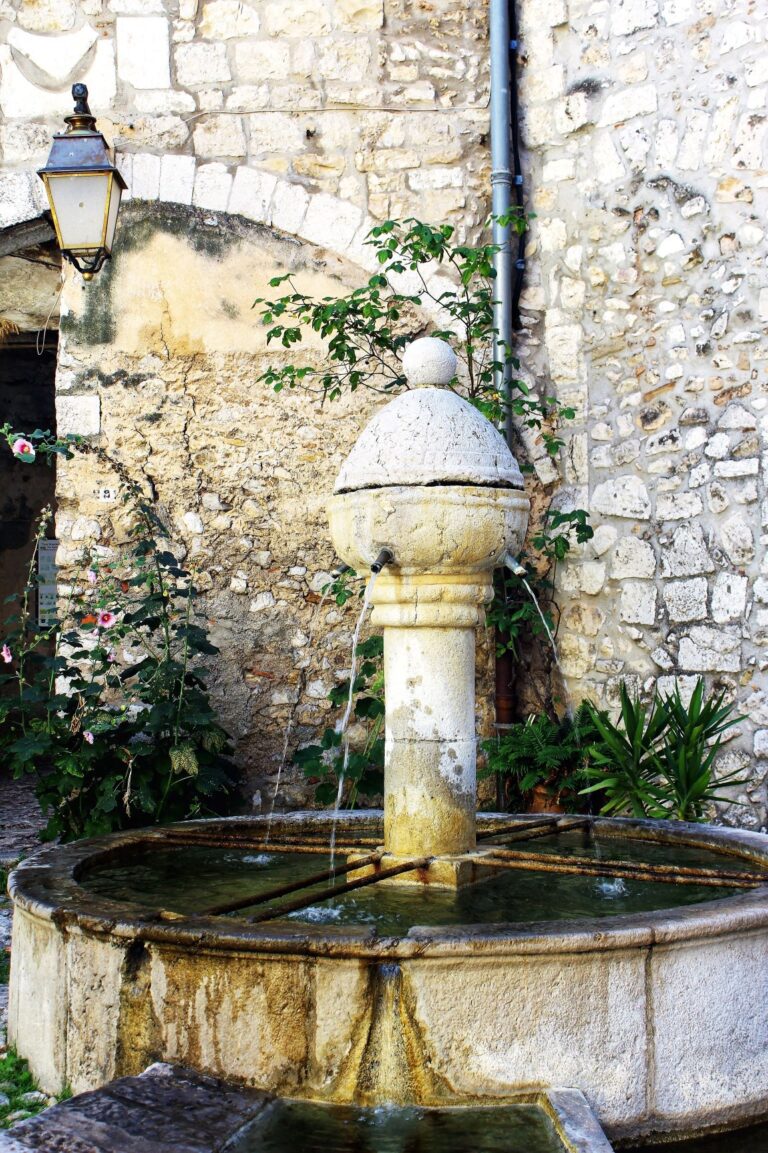 stone water fountain in France