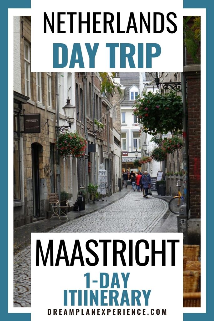 cobblestone street lined with shops in maastricht must see