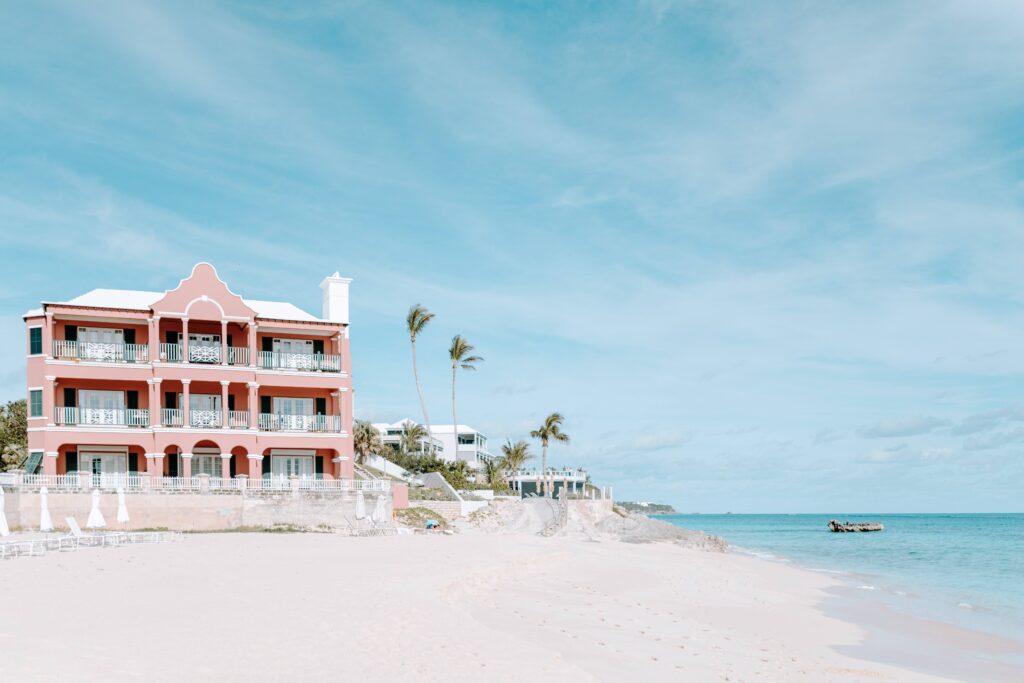 beach with pink building with sea in weekend in bermuda