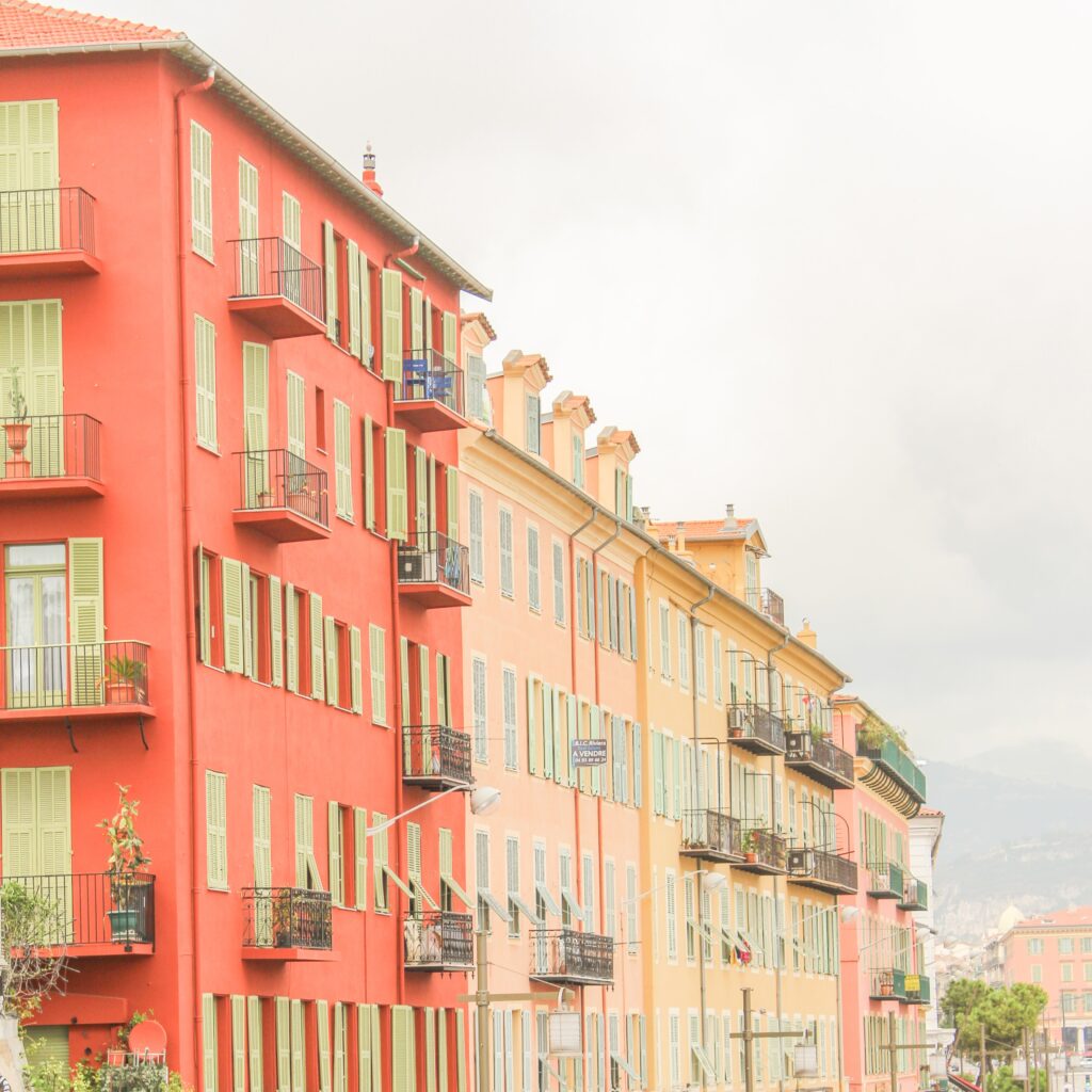 orange pink and yellow buildings in things to do nice france