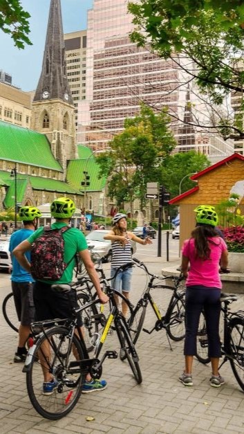 people on bikes in neighbourhood montreal