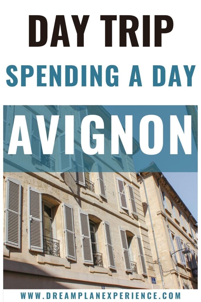 building with pale blue shutters on day trip to avignon france