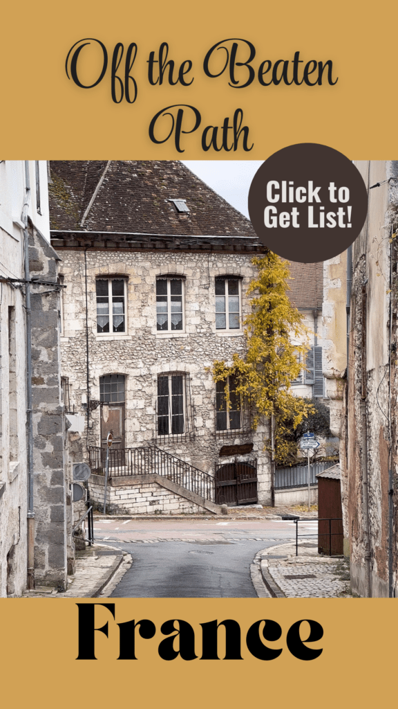 stone village with building and text that reads off the beaten path france