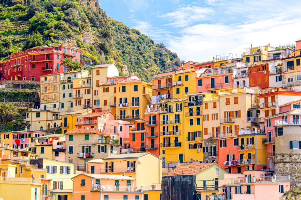 colourful houses perched on side of mountain in cinque terre itinerary 3 days