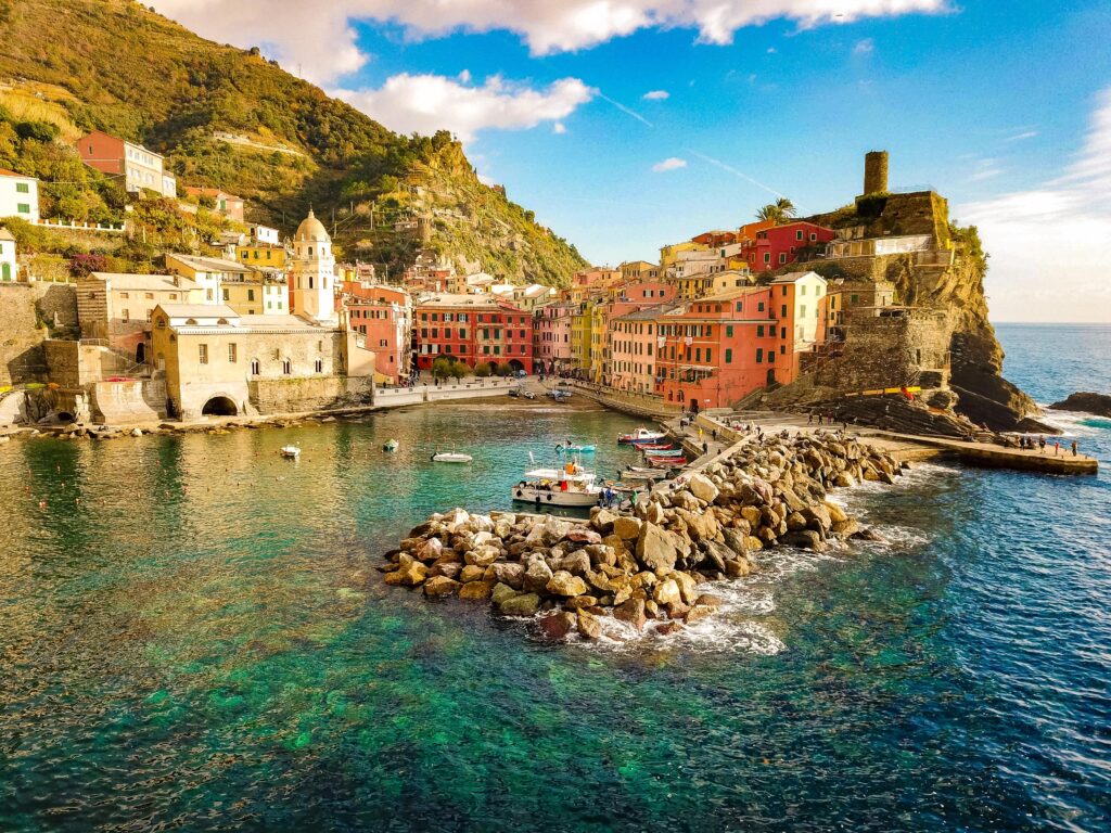 sea with rock shore and colourful houses in cinque terre itinerary 3 days