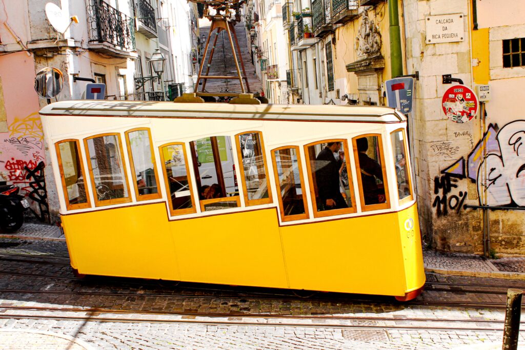yellow tram on graffiti street