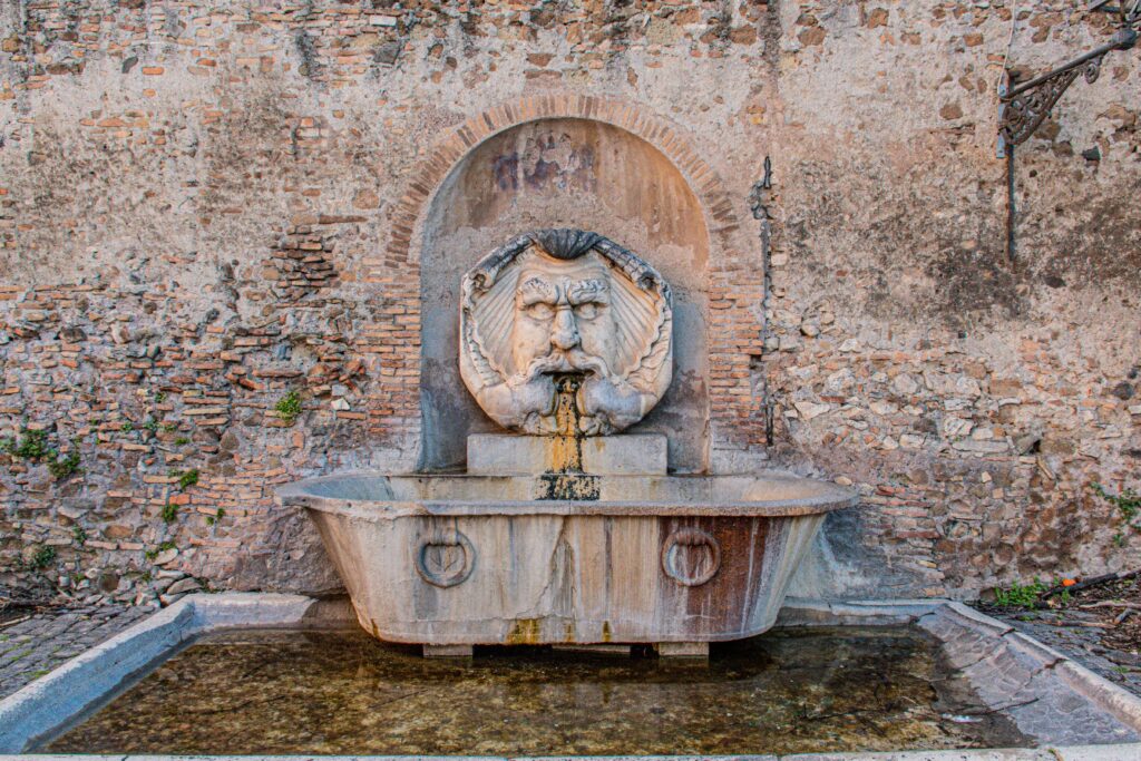 fountain of man carving on wall in how many days in rome is enough