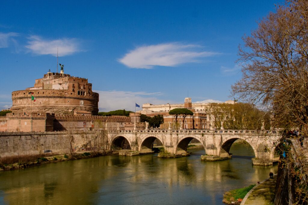 bridge with 5 arches leading to round castle on vatican city 1 day itinerary