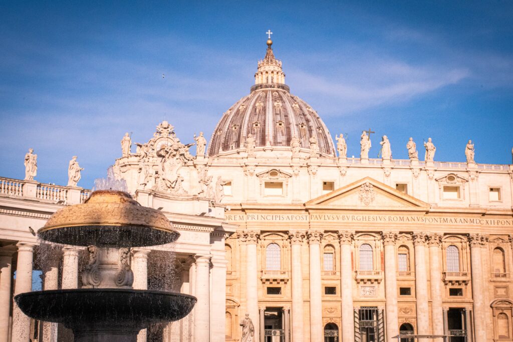 church dome and fountain on a one day in vatican city tour