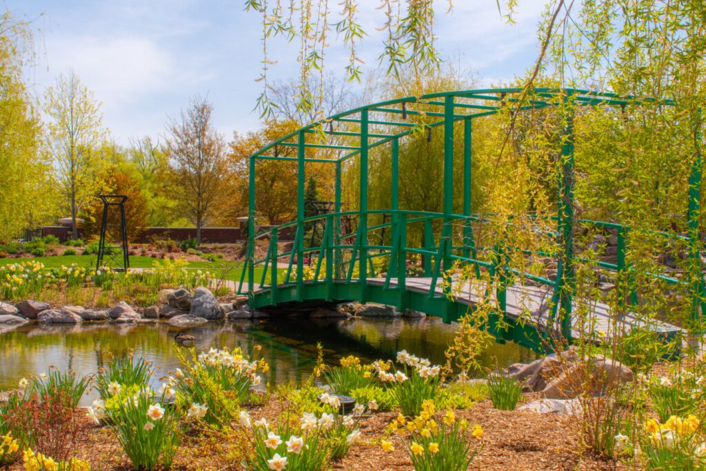 bridge with spring flowers in niagara on the lake couples getwaway