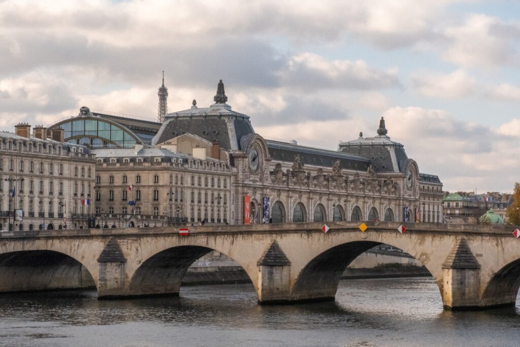 bridge on river seine with museum on best river cruises in paris