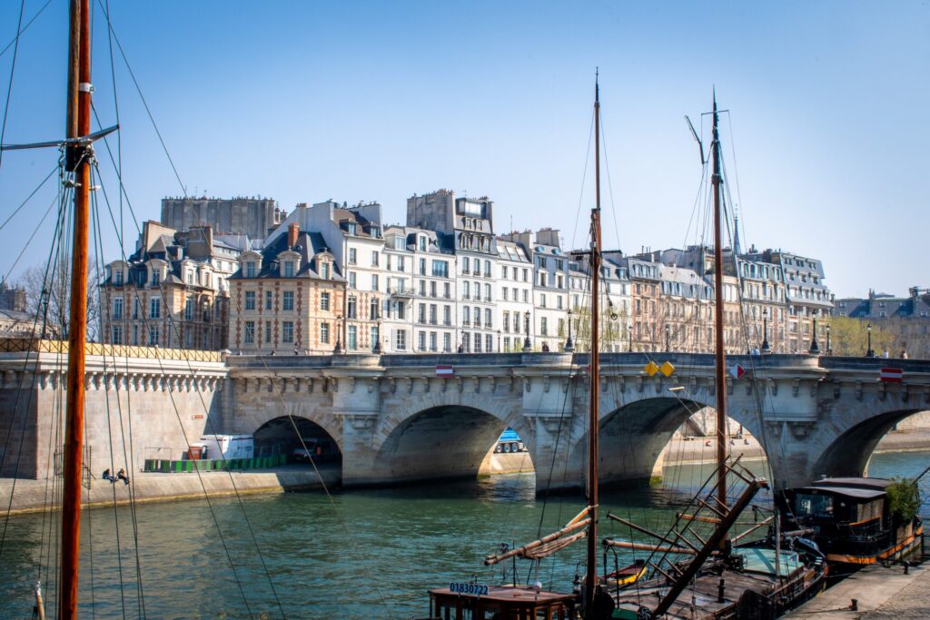 bridge, boats in cruise on river seine Paris