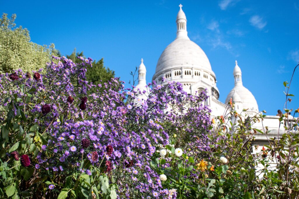white basilica with flowers in why to visit paris