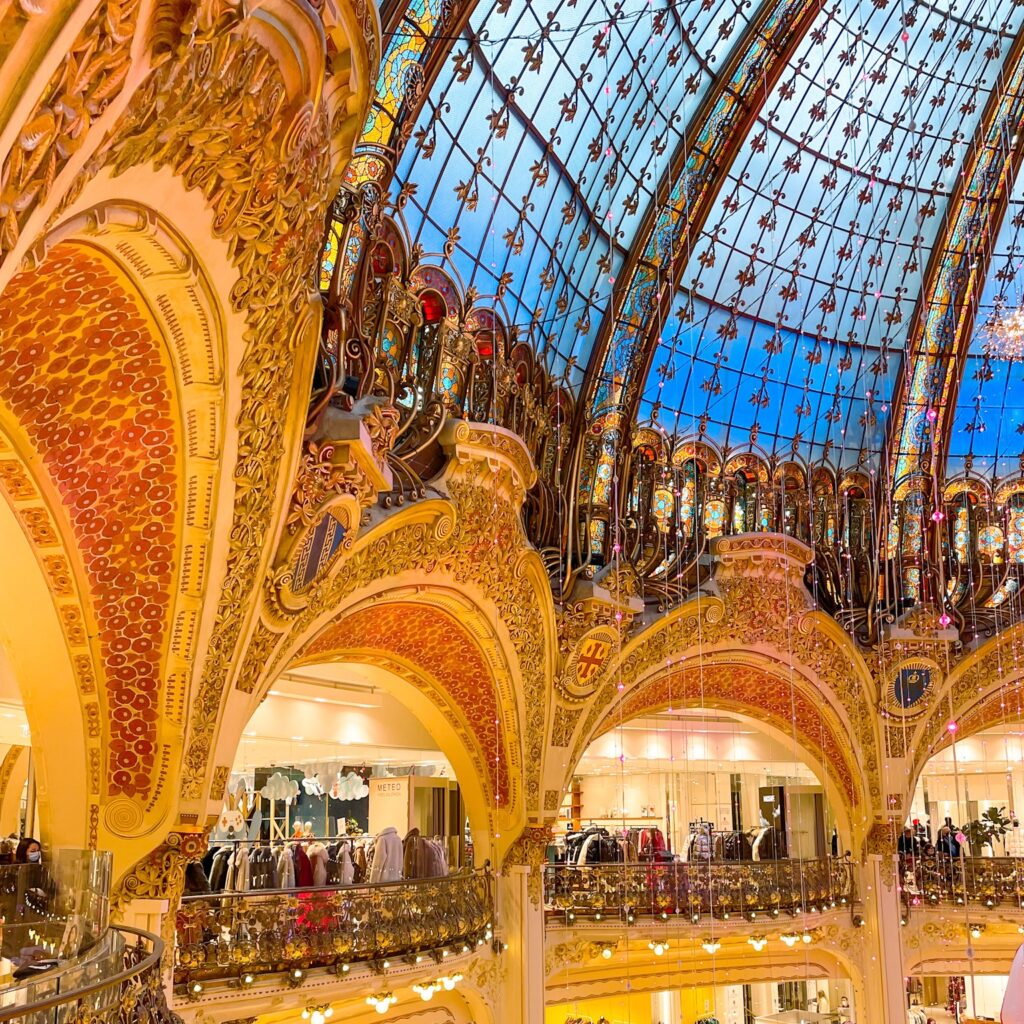 orate ceiling with glass in paris shopping mall