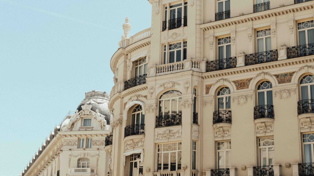 tall buildings with iron railings in spain travel