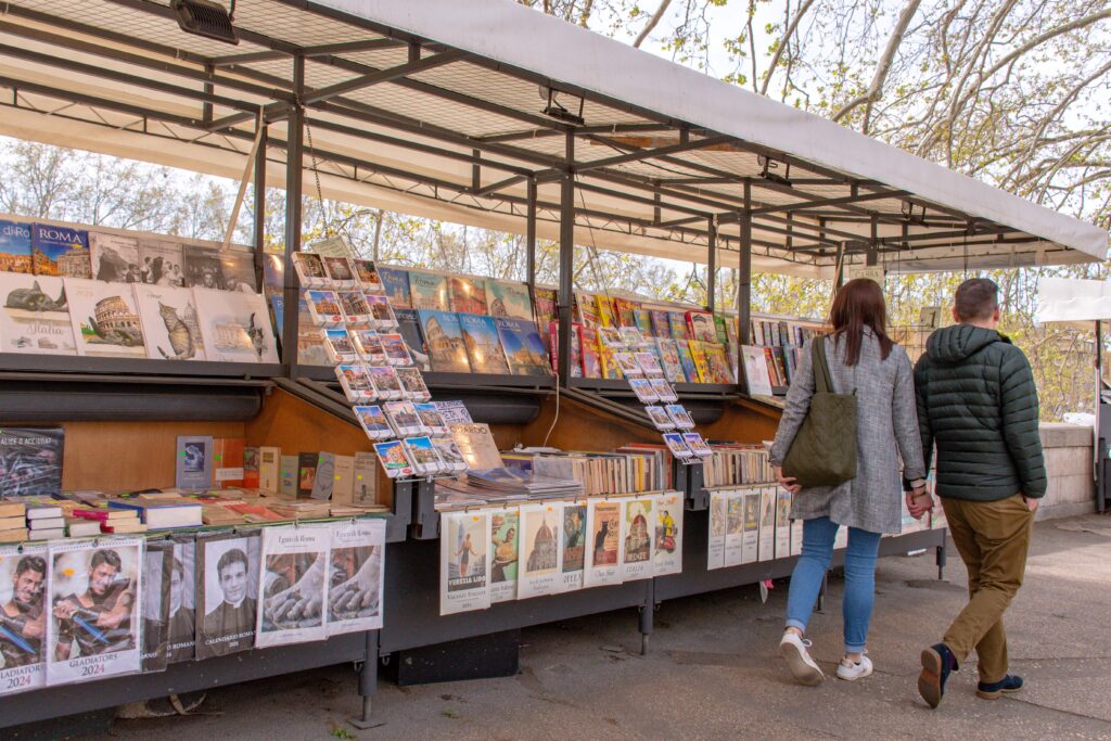 book stand with couple in on visit in rome