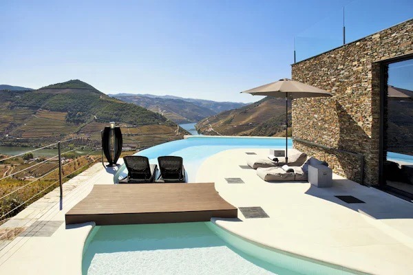 pool with view of douro valley portugal village