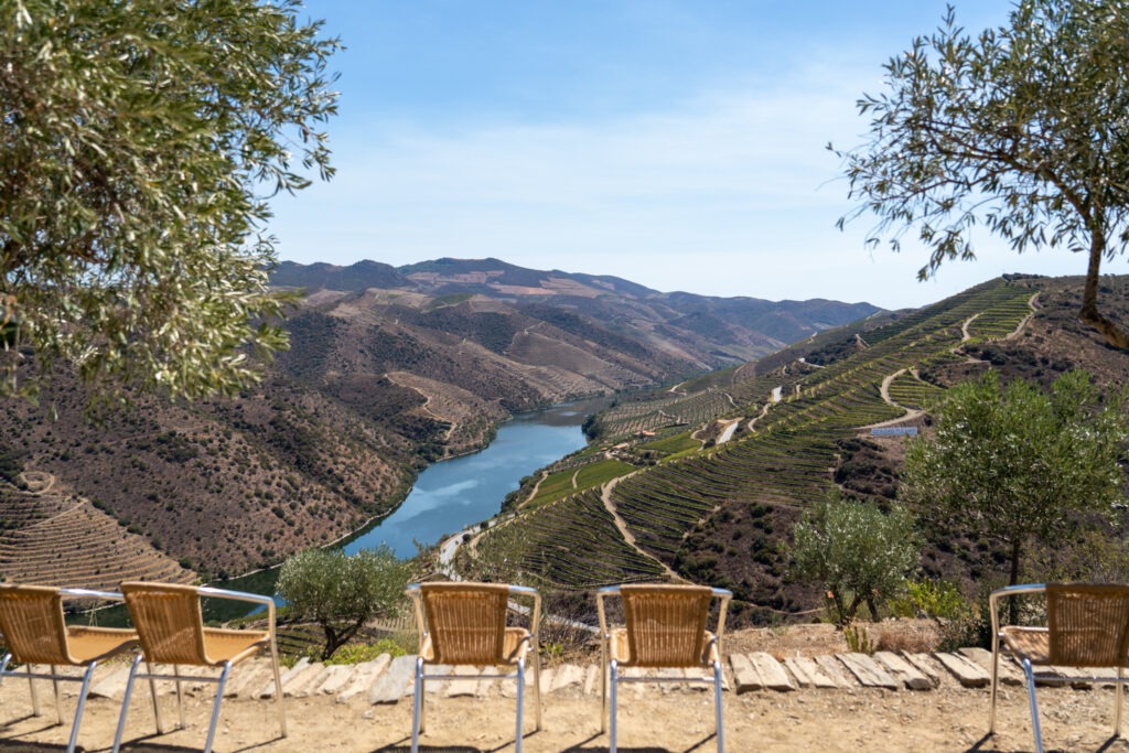 4 chairs, view of douro river from beautiful towns in portugal
