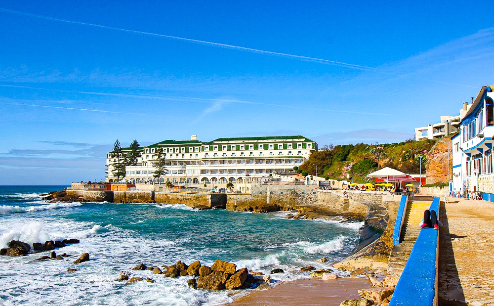 ocean with beach and building in portugal villages