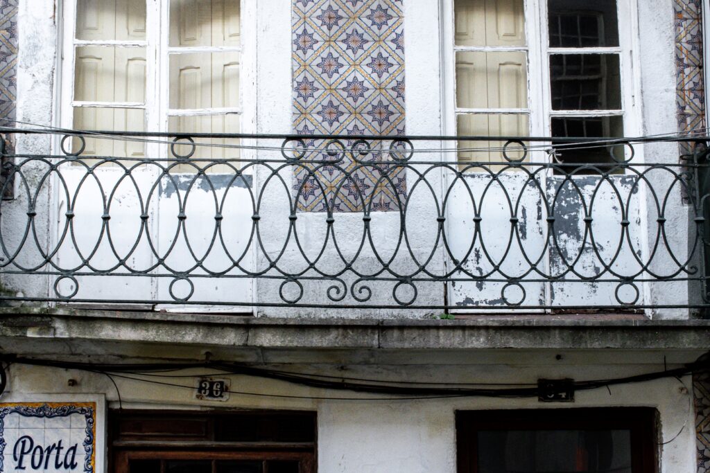 iron railing and tile in how many days to spend in porto