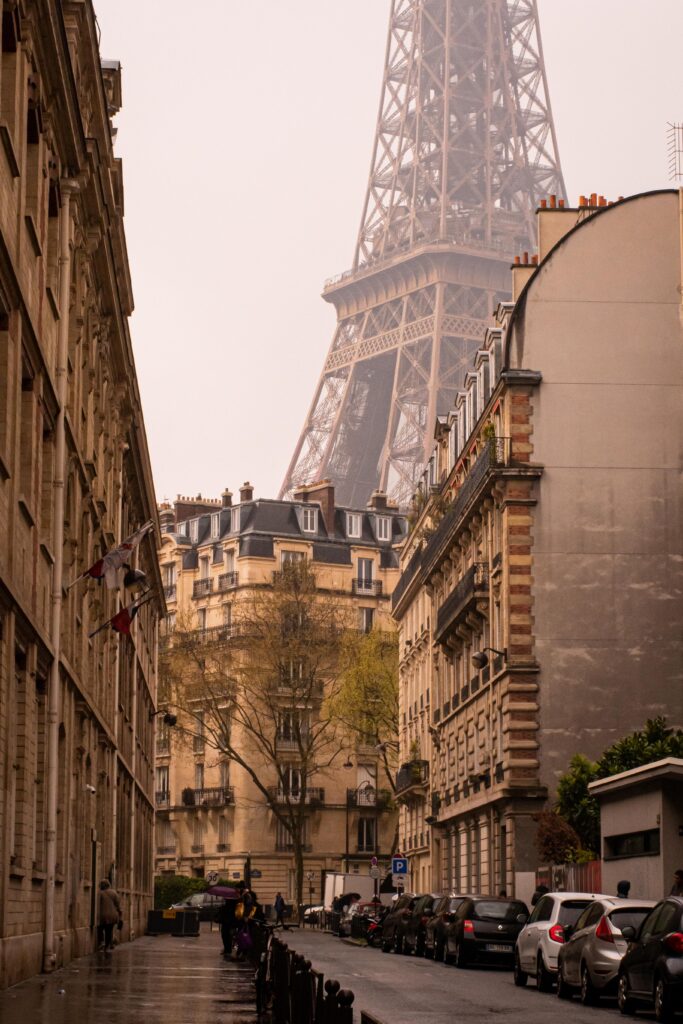 eiffel tower on street in paris and then tour the paris catacombs tickets