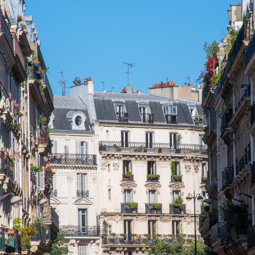 buildings with flower boxes on planning a paris trip