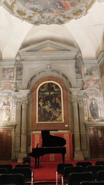 church with grand piano and frescos on trip to florence and siena