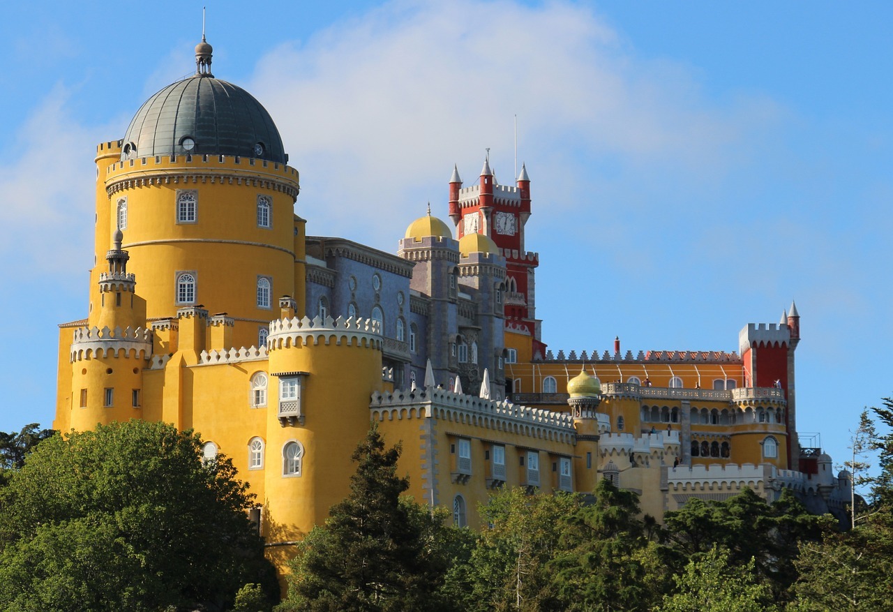 palace in yellow, red and purple on day trips from Lisbon