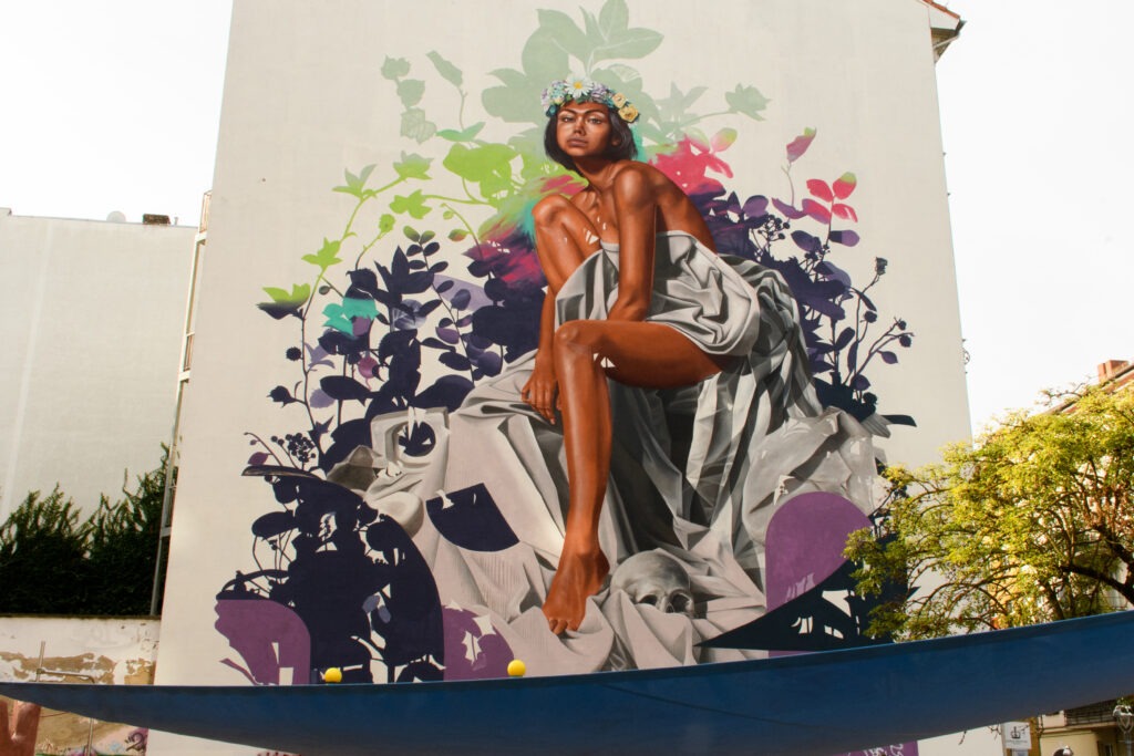 street art on wall of black women and flowers on things to do on sunday
